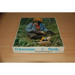 Ti - ta tovenaar. Aap. Jig saw puzzle.